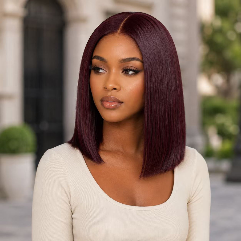 Model wearing a shoulder-length 99J straight human hair wig
