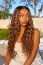 Model wearing a long P4/27 water wave human hair wig outdoors