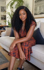 Lifestyle view of a natural black deep wave glueless human hair wig
