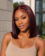 Model wearing a 99J burgundy 13x4 bone straight Vietnamese human hair wig